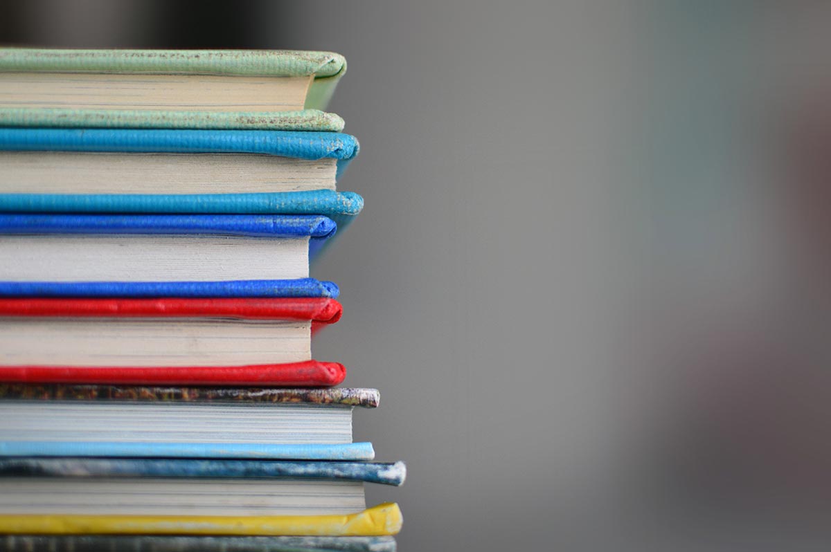 Colorful books stacked together
